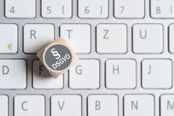cube on a keyboard showing the German abbreviation for \