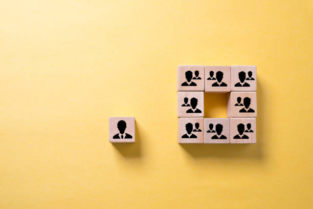 istock organization and a leader with employees symbolized with cubes 1092924424