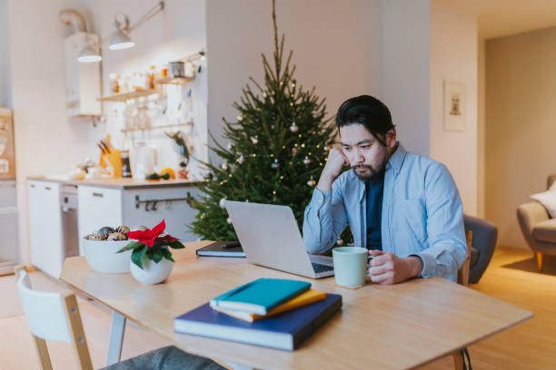 istock Young Asian man having a video conference call 1092924816