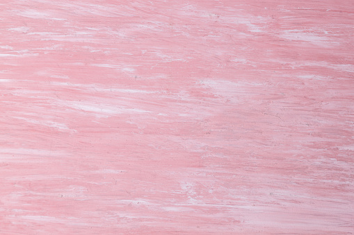 Pared con textura grunge rosado. Fondo de piedra oscuro. photo