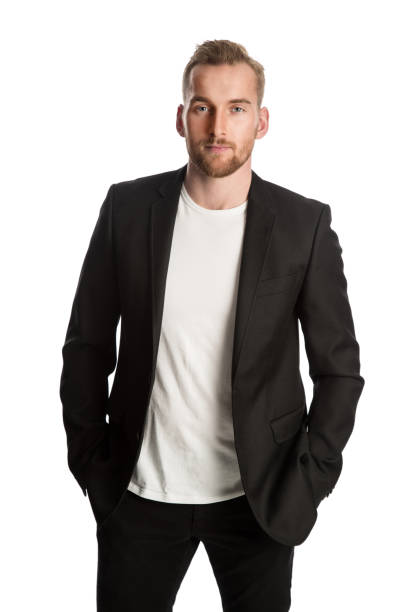 Blonde businessman in black jacket Handsome blonde man standing in front of a white background wearing a black blazer. Smiling looking at camera. business casual fashion stock pictures, royalty-free photos & images