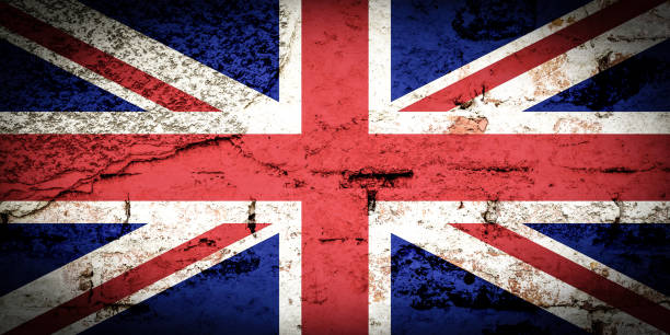 istock UK flag with old dirty grunge wall texture 1092983422