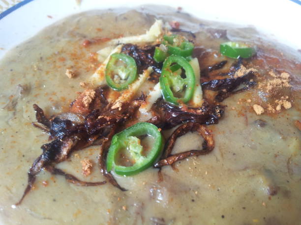 Delicious traditional haleem dish with green pepper  in a bowl