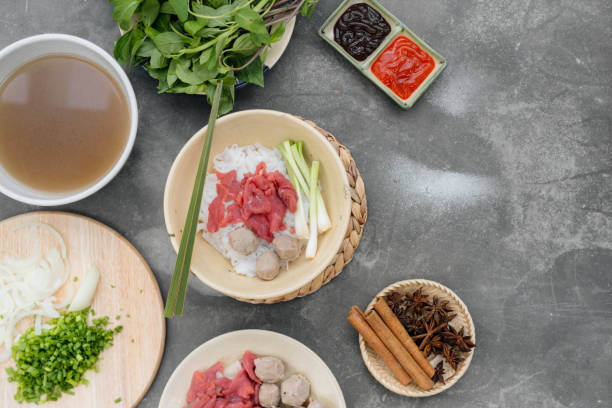 istock Assorted asian dinner with vietnamese noodle soup pho bo, 1092999446