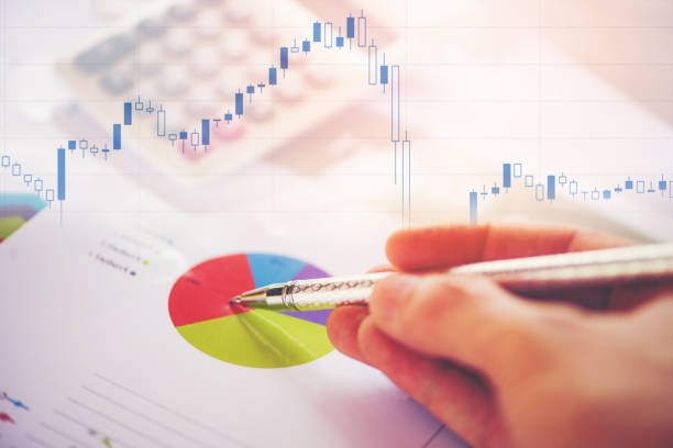 istock Business report chart preparing graphs calculator stock graphs and number Display screen / Summary report in Statistics 1093013318