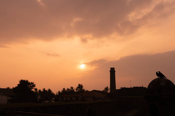 istock sunset with clock tower gall sri lanka 1093016840