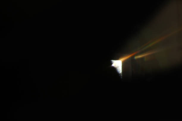 istock Abstract background - light color flashes and rays on black. Lens flare. 1093032290