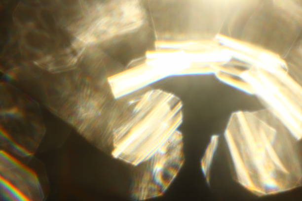 istock Abstract background - light color flashes and rays on black. Lens flare. 1093032620