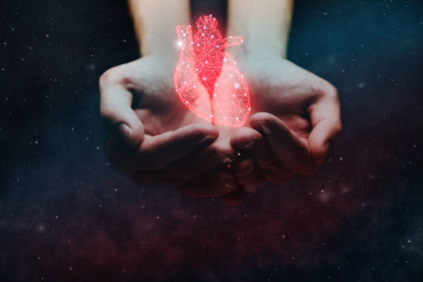 istock Human hold on a palm heart innovative technologies. Nebula dust  in infinite space. Mixed media. 1093033200