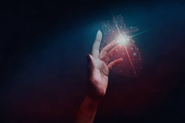 istock Human forefinger touches red heart innovative technologies. Nebula dust  in infinite space. Mixed media. 1093034358