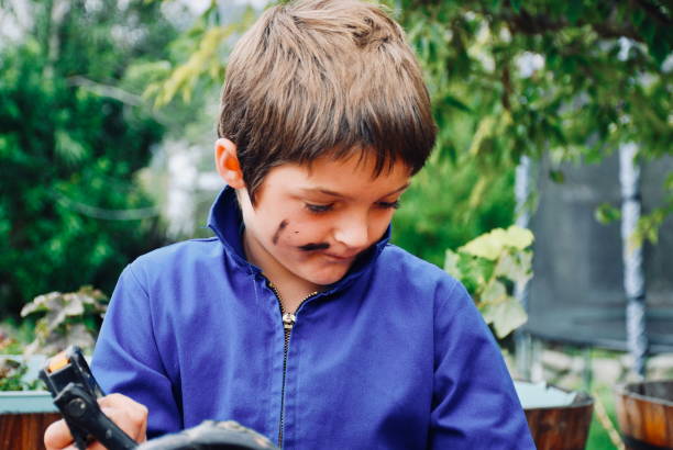 istock Child Repairing his Bicycle 1093034762