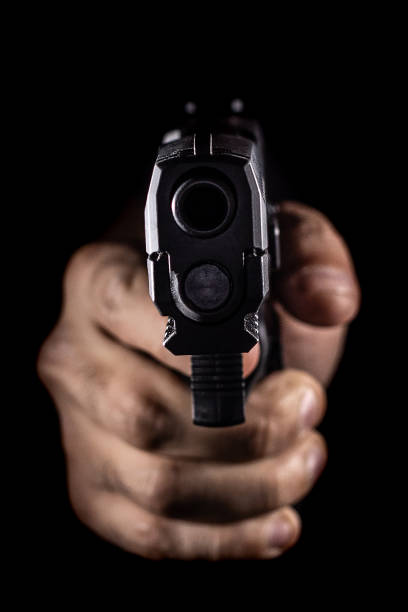 istock Black Semi-Automatic Handgun Pointed Directly at You - No Subject in Background 1093036302