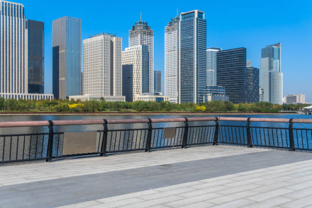istock Empty pavement and the city skyline 1093036424