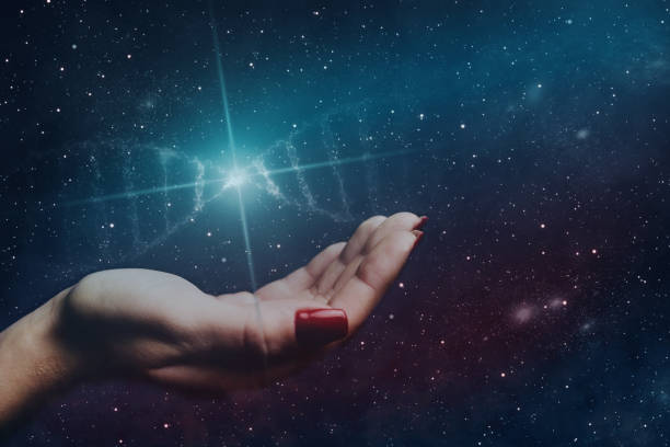 istock Close up of woman Touching DNA molecule. Nebula dust in infinite space. Mixed media. 1093038204