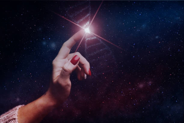 istock Close up of woman Touching DNA molecule. Nebula dust in infinite space. Mixed media. 1093038236