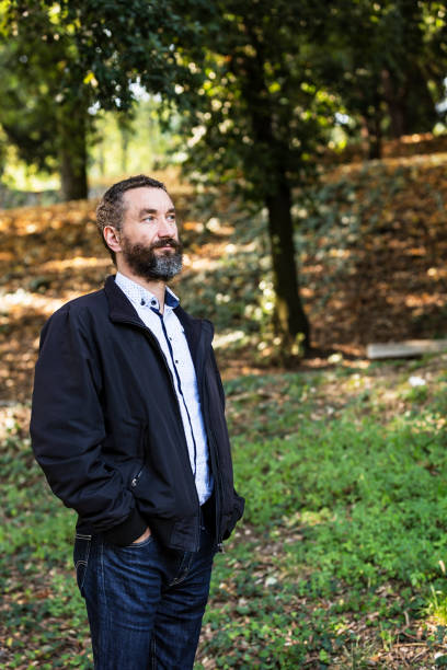 istock cute smiling man with a grizzled beard 1093038418