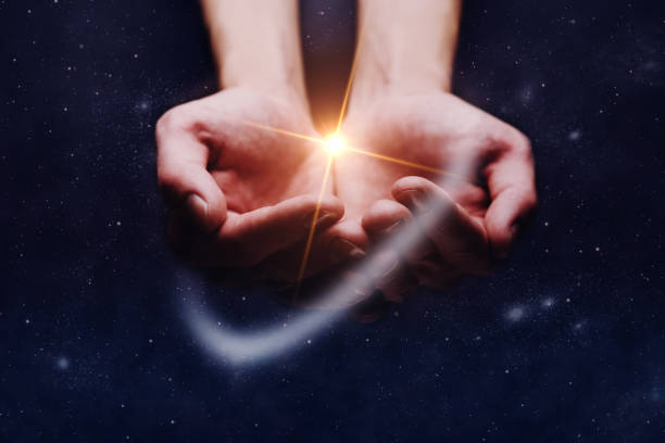 istock Hand hold a new star in infinite space. Mixed media. 1093038598