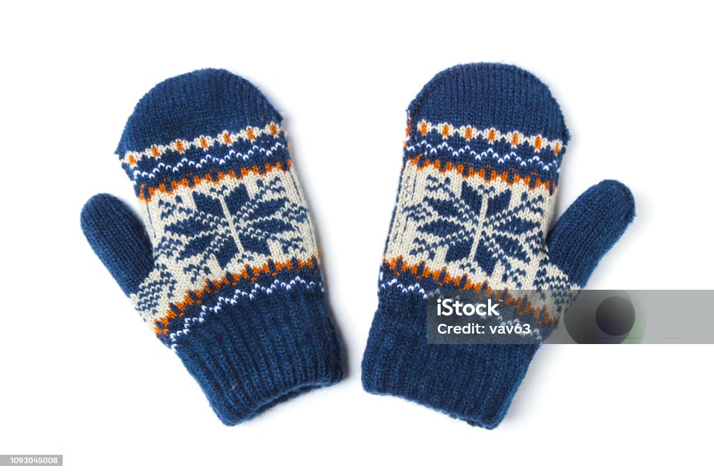 Children's knitted mittens Children's woolen patterned knitted mittens isolated on white Glove Stock Photo