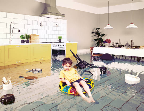 istock boy in the flooded room 1093052528