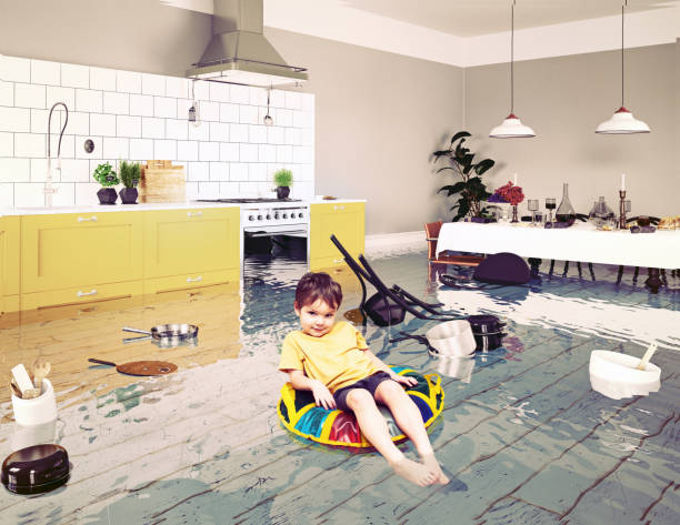 boy in the flooded room boy in the flooded room. Media elements mixed natural disaster photos stock pictures, royalty-free photos & images