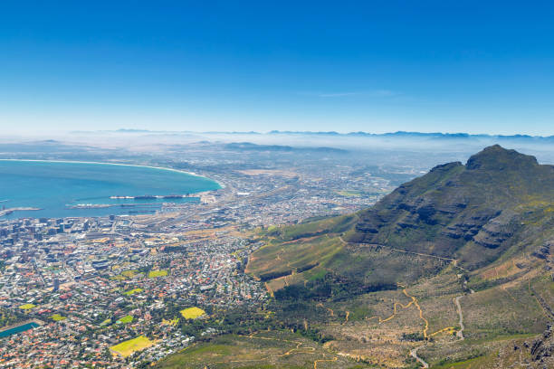 istock Cape Town and mountains in fog view from Table Mountain top 1093054072