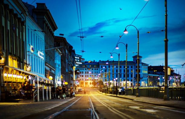 istock Light and traffic at night, long exposure and soft focus. Blurry beautiful urban district background, with tram on tract moving. 1093059428