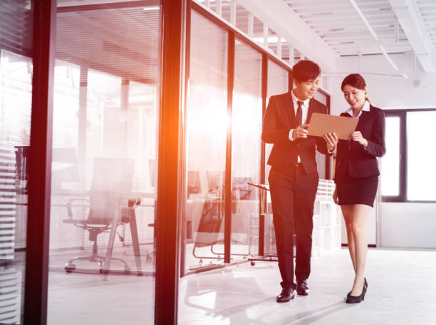 istock young business people discussing in office 1093062936