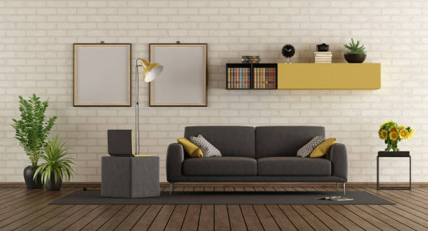 istock Modern living room with sofa and brick wall 1093071512