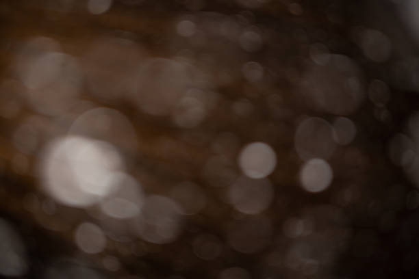 istock Background of falling snowflakes in the light of a lantern. 1093076342