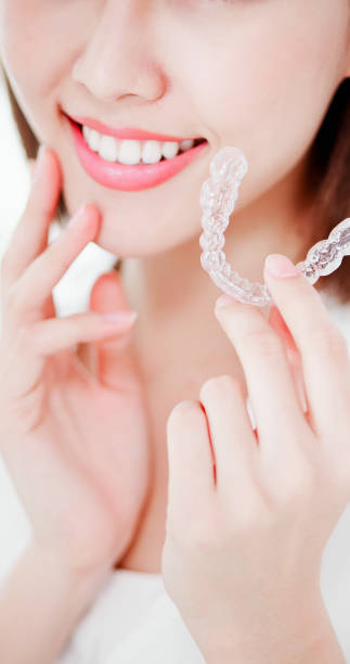 istock woman with teeth invisible brace 1093082446