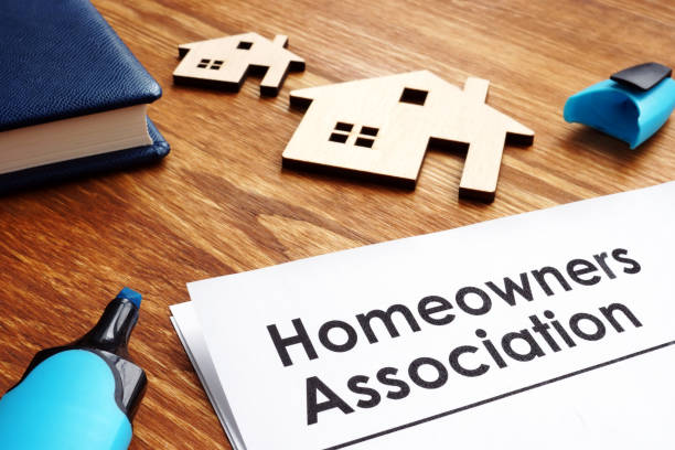 istock Documents about Homeowners Association HOA on a desk. 1093086284
