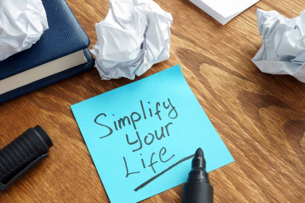 istock Simplify Your Life written on a memo stick. 1093086324