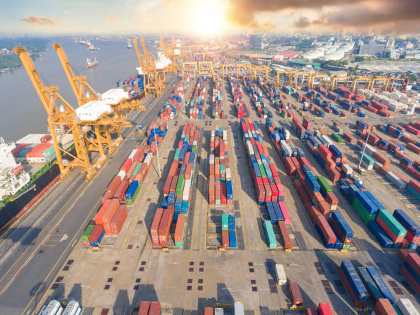 istock Logistics and transportation of Container Cargo ship and Cargo working crane bridge in shipyard 1093088260
