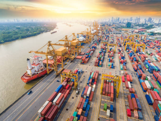 istock Logistics and transportation of Container Cargo ship and Cargo working crane bridge in shipyard 1093088264