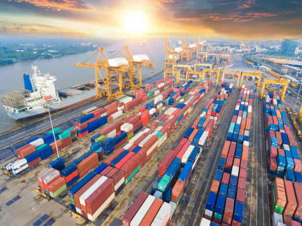 istock Logistics and transportation of Container Cargo ship and Cargo working crane bridge in shipyard 1093088272