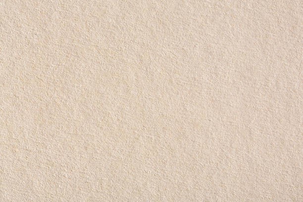 istock Cream paper texture background for scrapbooking on macro. 1093093812