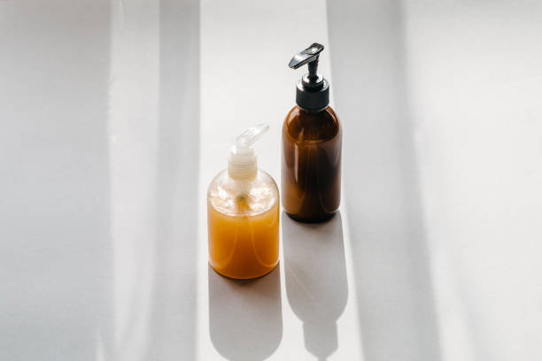 istock Clear plastic and glass brown cosmetic bottles 1093097264
