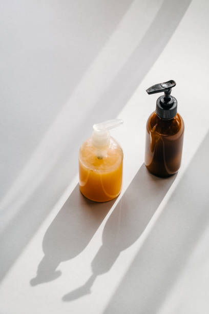 istock Clear plastic and glass brown cosmetic bottles 1093097266