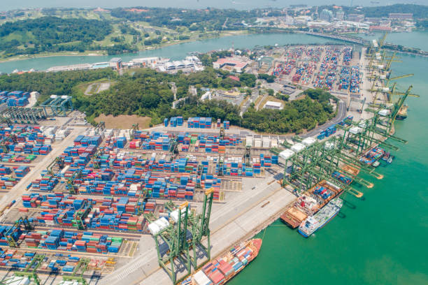 istock Logistics and transportation of Container Cargo ship and Cargo working crane bridge in shipyard 1093098400