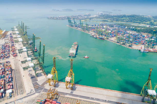 istock Logistics and transportation of Container Cargo ship and Cargo working crane bridge in shipyard 1093098918