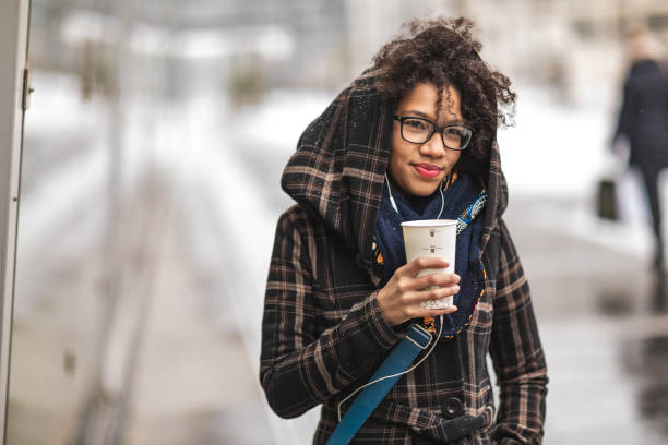 enjoying coffee and good music outdoors - snow glasses imagens e fotografias de stock