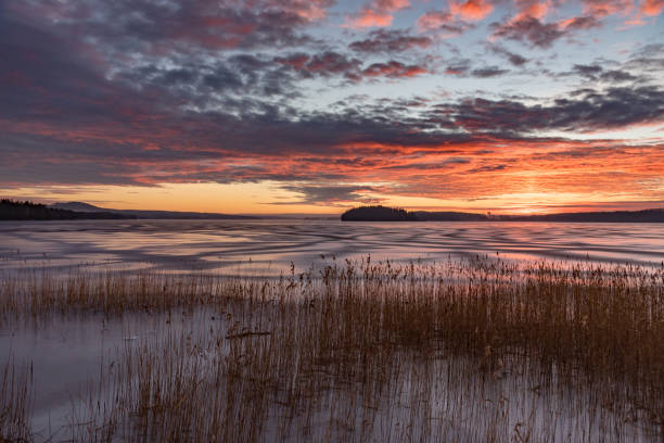 istock Sunset over frozen lake in Sweden 1093107558