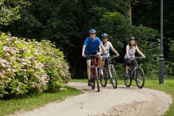 istock Urban biking- three people riding bikes in city 1093120668