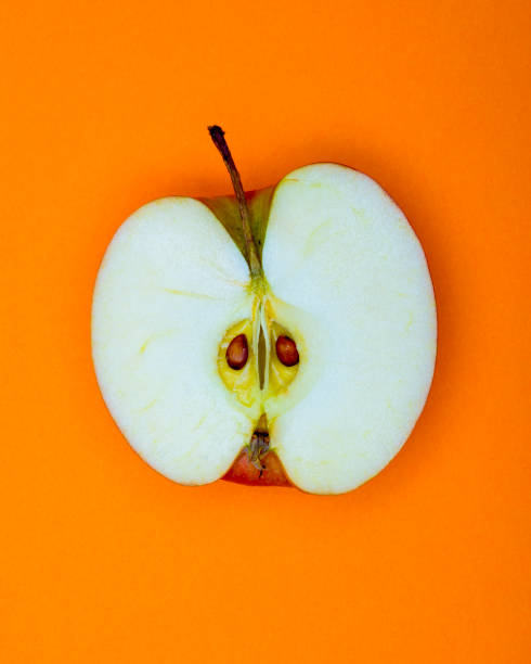 Bright background fresh fruit healthy Diet natural sliced food showing pips and stalk