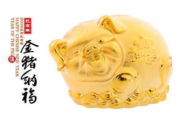 antique piggy bank with 1 ounce American gold eagle bullion coin isolated on white background