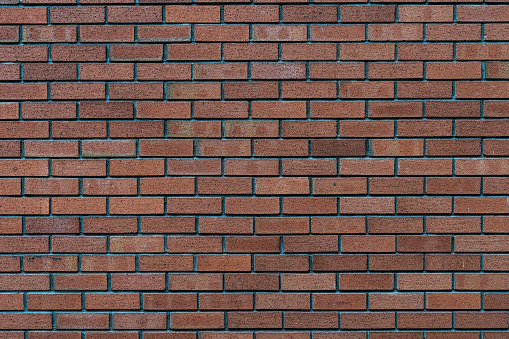 Full frame brick wall texture. Architectural decoration background.