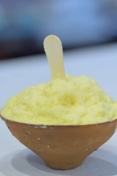 Winter dessert Malaiyo at road side shops in Varanasi