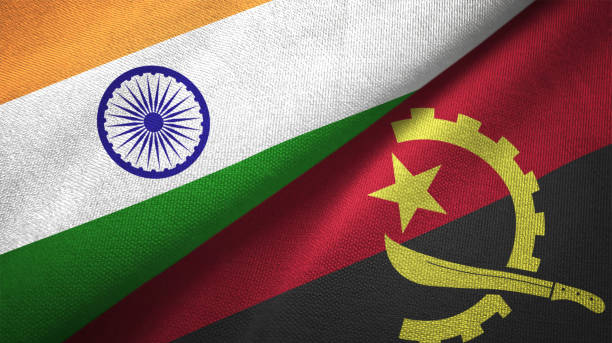 istock Angola and India two flags together textile cloth fabric texture 1093161630