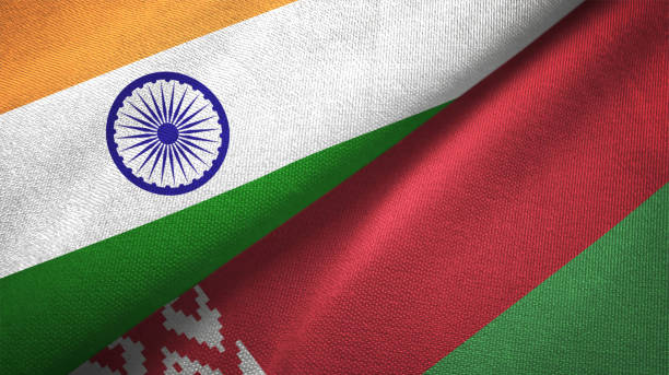 istock Belarus and India two flags together textile cloth fabric texture 1093161750