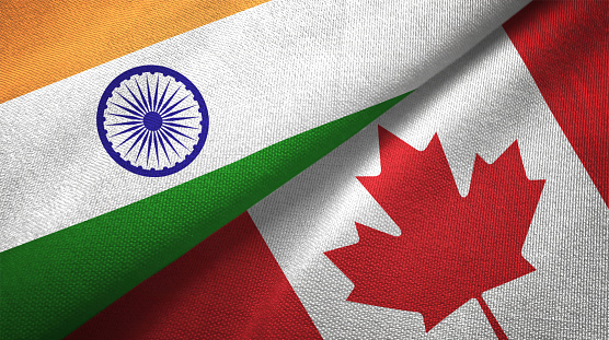 Canadá y la India dos banderas juntas textil tela textura de la tela photo